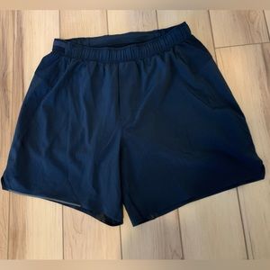 Men’s Lululemon Surge Lined Short 6”, size S, color dark blue.